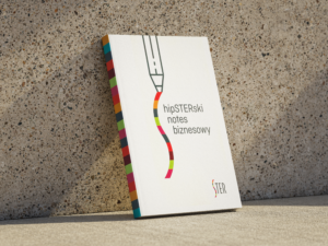 Biznesowy notes firmowy z autorską grafiką i kolorowym grzbietem firmy Ster