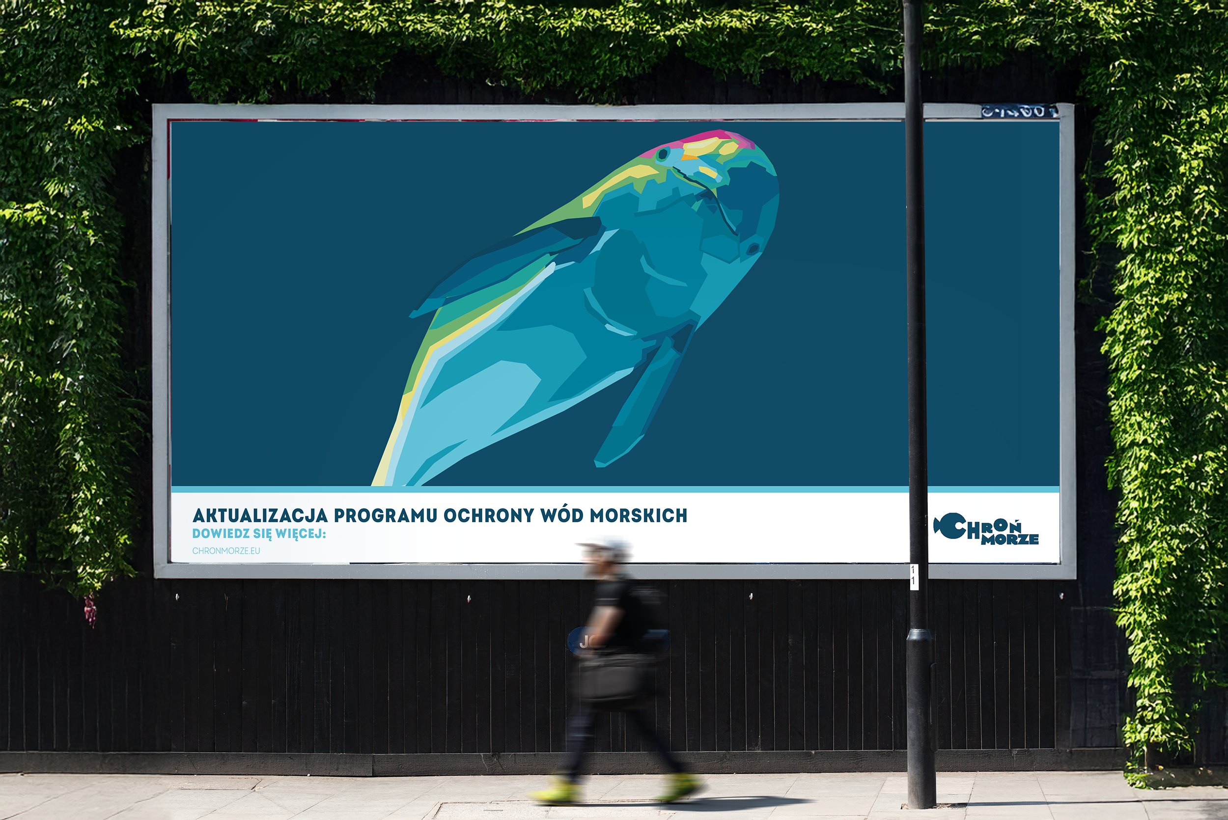 Billboard kampanii „Chroń morze” z ilustracją morskiego zwierzęcia w przestrzeni publicznej jako przykład komunikacji społecznej
